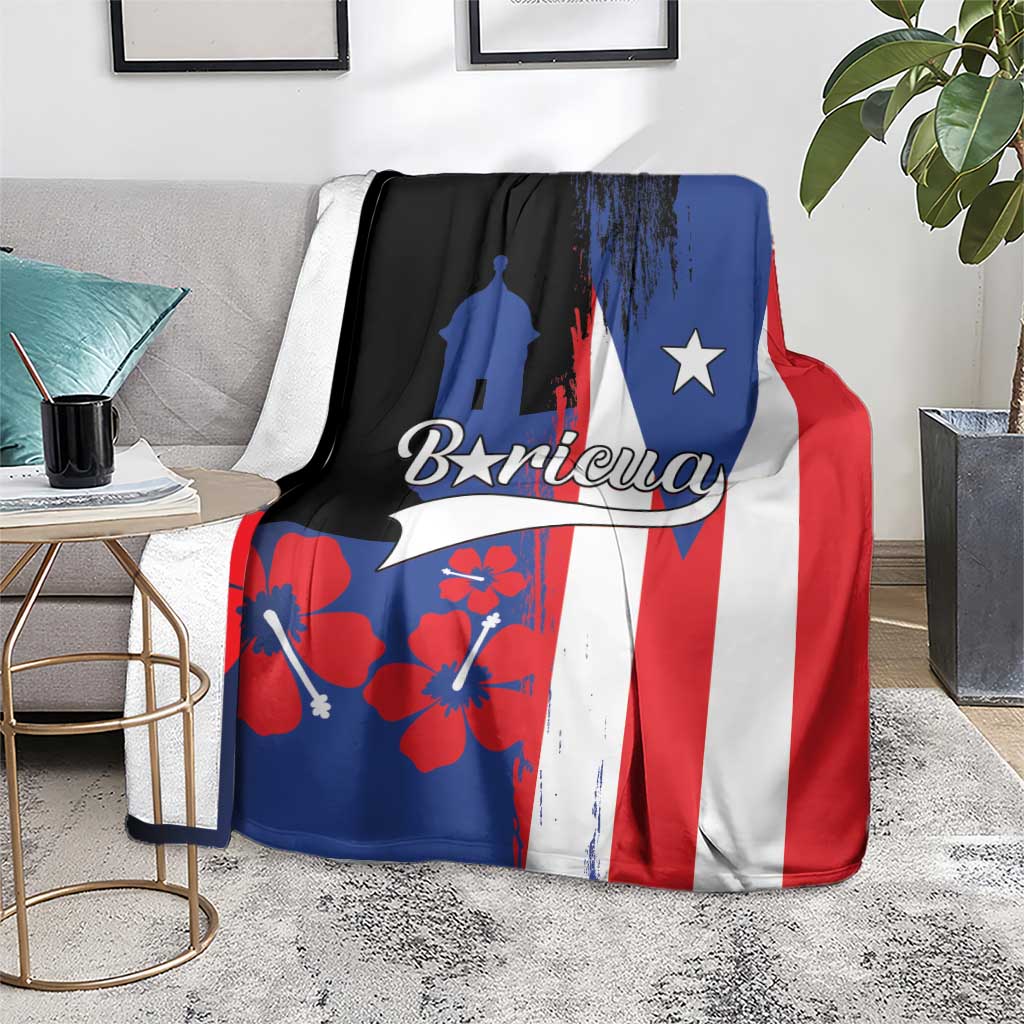 Puerto Rico flag-style fleece blanket spread on living room rug with Boricua text and island map