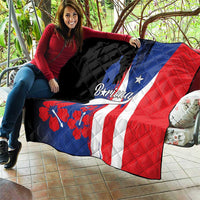 Quilt laid out, quilted diamond pattern with Puerto Rico flag colors: black, blue, red