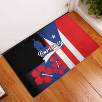 Black rubber doormat showing Puerto Rico flag design with Boricua text and star