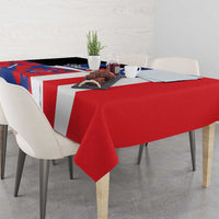 Flag-style Puerto Rico tablecloth on dining table, red blue white stripe design