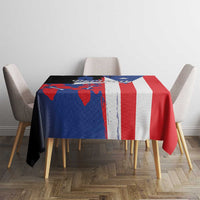 Flag-style Puerto Rico tablecloth on small square table, red blue white stripes and accents