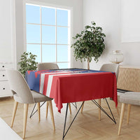 Flag-style Puerto Rico tablecloth covering dining table, red blue and white stripes