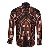 Unisex long-sleeve button shirt in black with orange dashiki-style back graphic