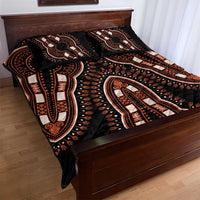 Black bed set quilt with bold orange and cream elephant motif along bed width