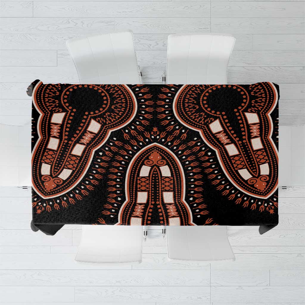 Black tablecloth with orange dashiki-style circular motifs, rectangular coverage