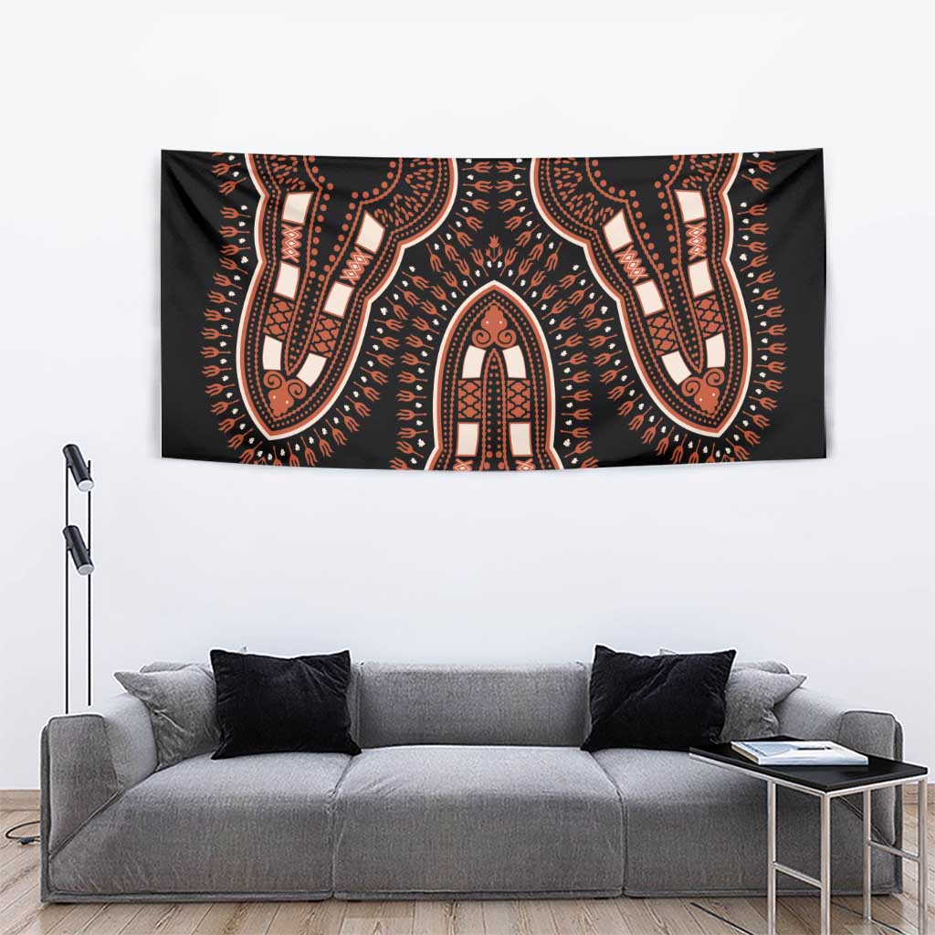 Black decorative tapestry with orange dotted accents and tall ornamental figure shapes