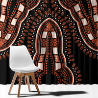 Black dashiki window curtain with ornate orange, tan, and white figure medallion design.