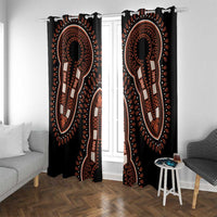 Black dashiki patterned window curtains with orange, tan, and dark medallion figure print.