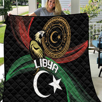 Black quilted throw blanket with Libya crescent, star, and eagle emblem