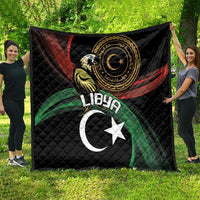 Black quilted blanket featuring Libya crescent, star, and eagle emblem