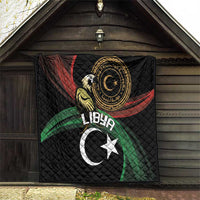 Black quilted blanket hanging display with Libya crescent, star, and eagle emblem