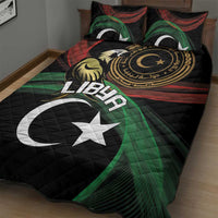 Black quilt bed set featuring green and red wave graphics, gold emblem, crescent and star; 2 pillows