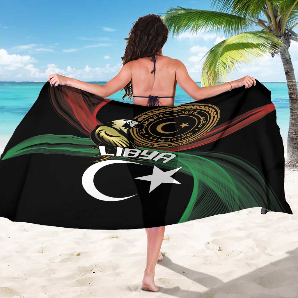 Black sarong draped over shoulders with Libya emblem, flag colors, white star and crescent