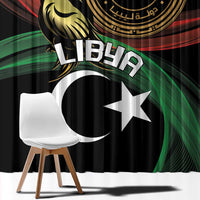 Black window curtain with large white crescent and star, gold emblem, red and green accents