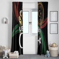 Black window curtain set with white crescent and stars, gold emblem, red and green accents