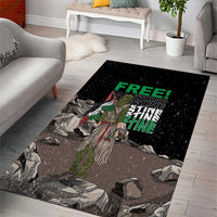 Black area rug with eagle artwork and neon green 'FREE' text, angled view