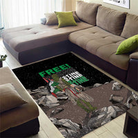 Black area rug with eagle design and neon green 'FREE' text, centered on floor