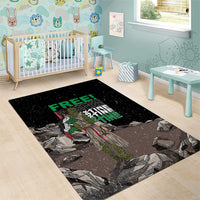 Black area rug with eagle artwork and neon green 'FREE' text, wide view