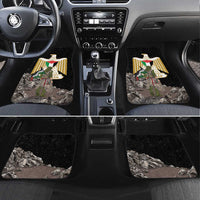 Black car floor mats with Eagle of Saladin emblem graphic and rock pattern, front row