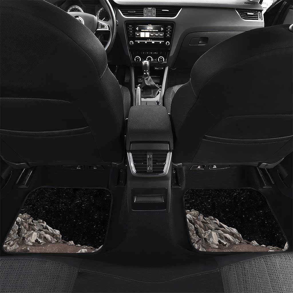 Black car floor mats with rock pattern and Eagle of Saladin emblem, rear footwells