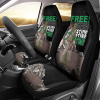 Black car seat covers with green 'FREE!' and eagle camouflage design on both seats