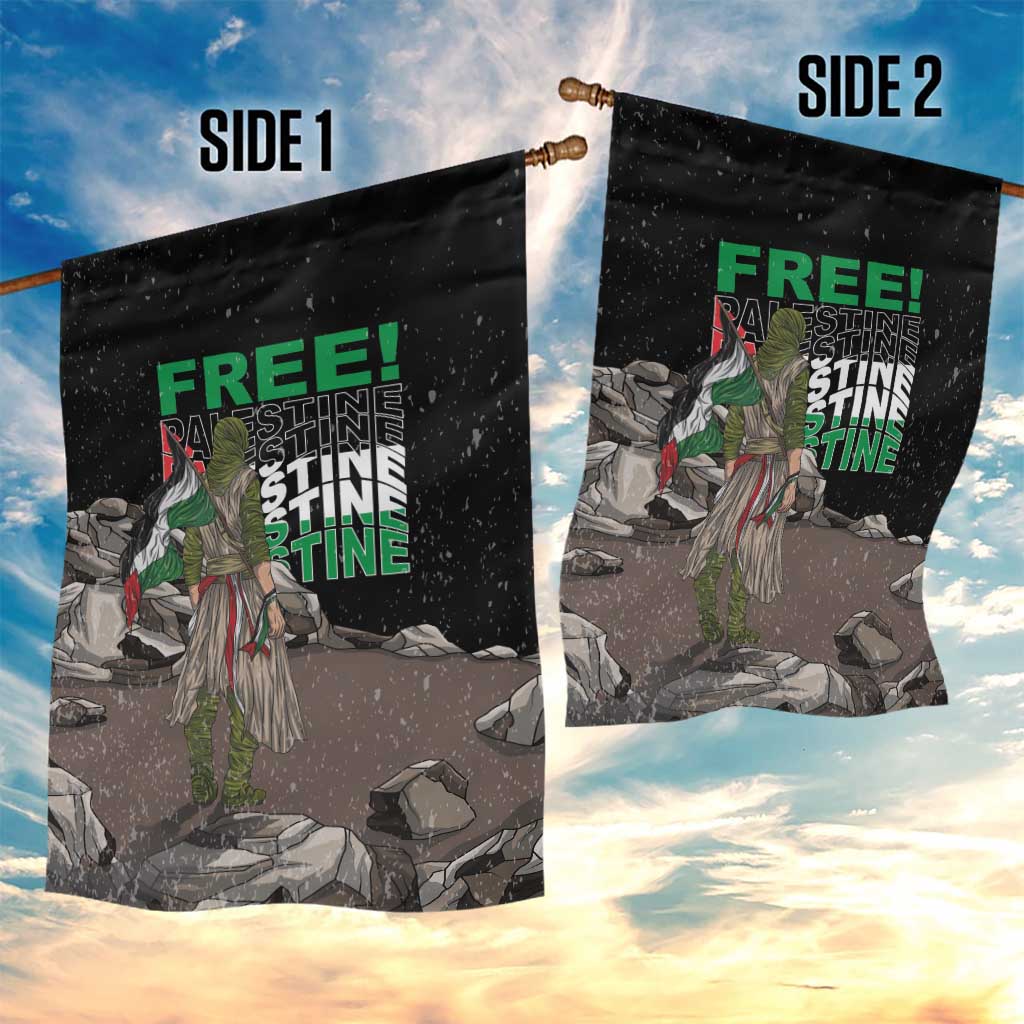 Two black garden flags on poles with 'FREE!' and 'PALESTINE' text over illustrated ruins