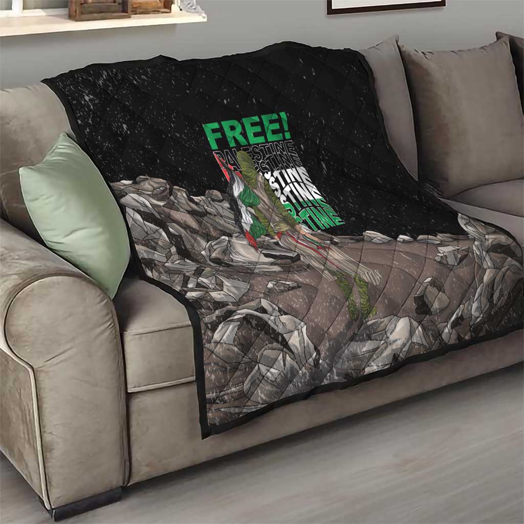 Black quilt with diamond stitching and Palestine-themed graphic on a living room sofa