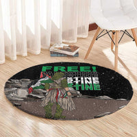 Black round carpet with green 'FREE PALESTINE' text and warrior illustration, centered