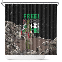 Black shower curtain with green “FREE!” text, figure in green armor, rubble scene
