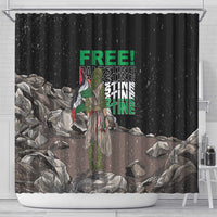 Black shower curtain with green “FREE!” headline and central figure, rubble graphic