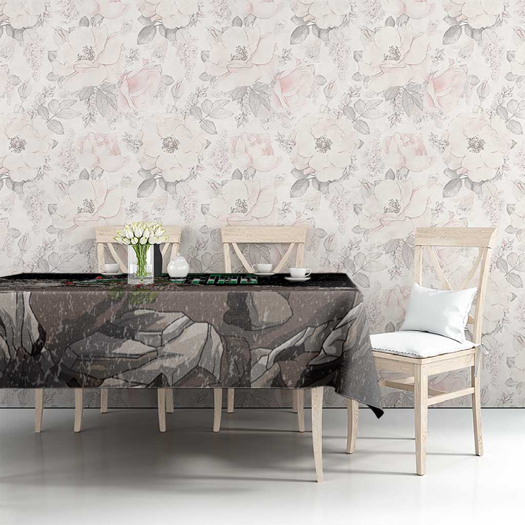 Black tablecloth with eagle graphic and gray landscape pattern