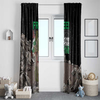 Black window curtain pair with eagle and “FREE!” green text over gray rock pattern