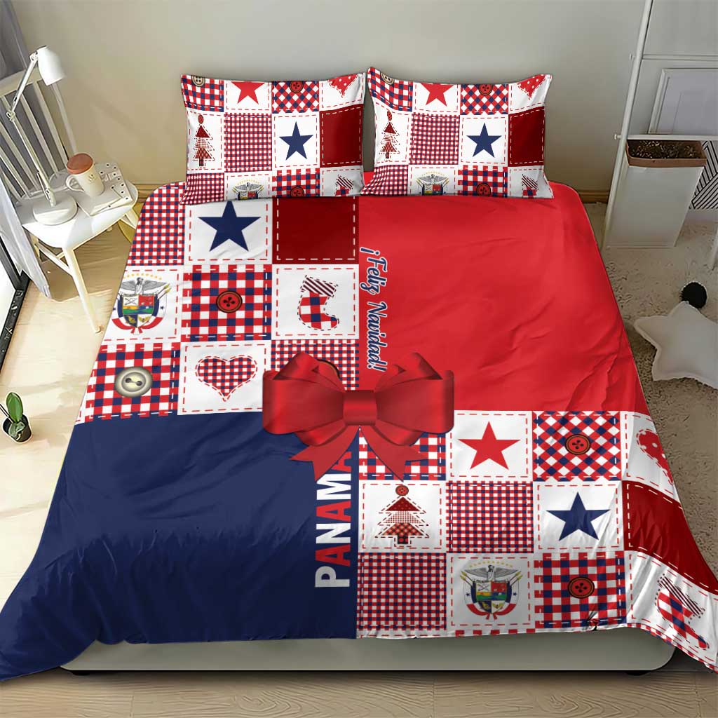 Christmas bedding set with patchwork squares in red, blue, and white, matching pillows and bow