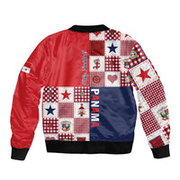 Red and navy patchwork bomber jacket with stars, plaid sleeves, ribbed hem and cuffs