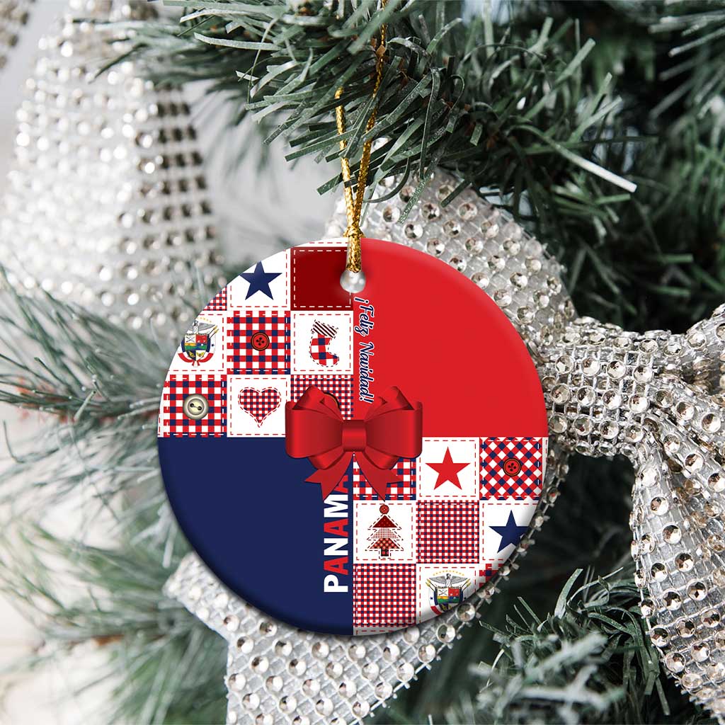 Ceramic Christmas ornament featuring red and navy patchwork with ribbon bow and gold cord
