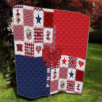 Quilted Christmas throw quilt with red top, navy bottom, patchwork blocks, bow applique