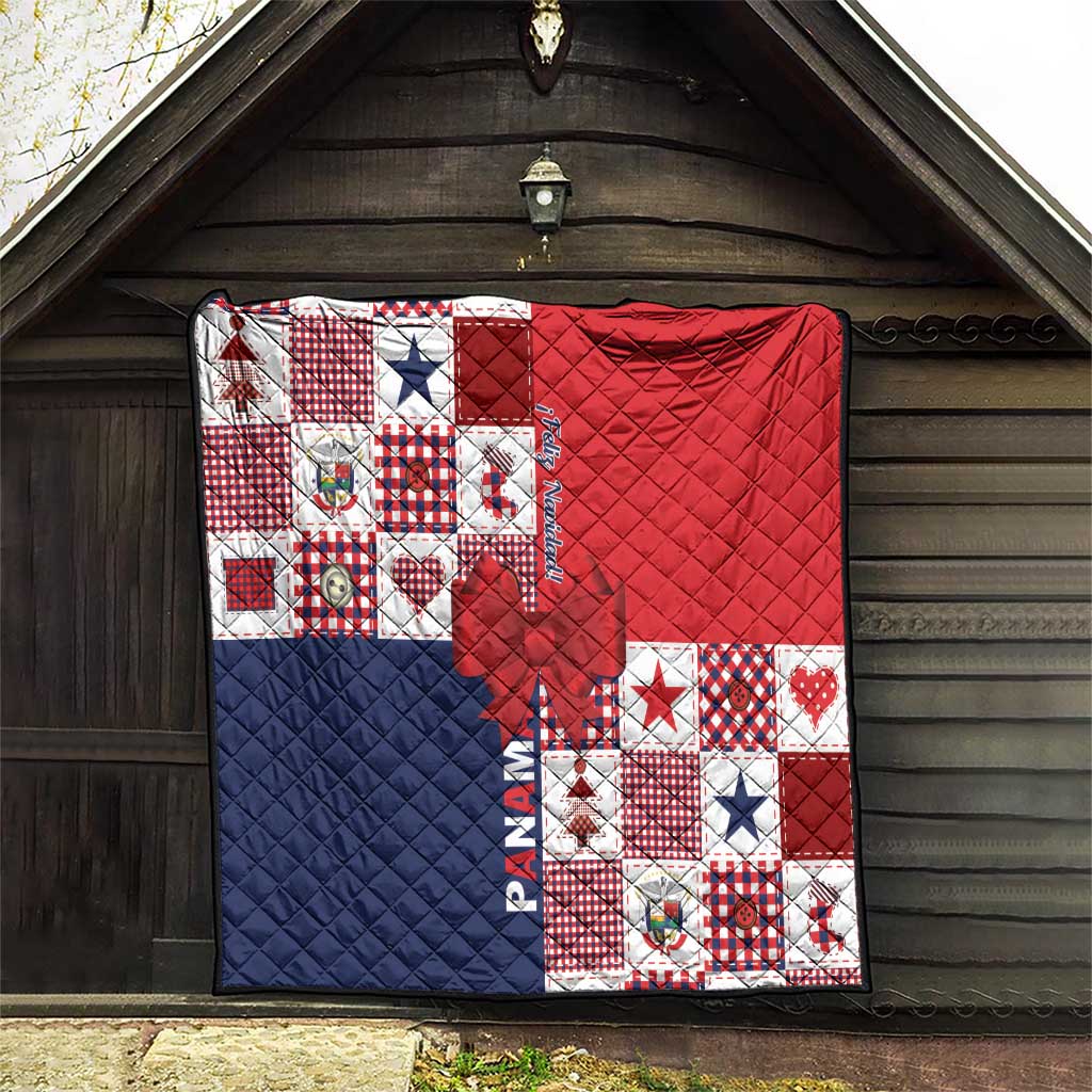 Red and navy patchwork Christmas quilt with bow applique, quilted diamonds, stars
