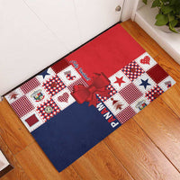Red and navy patchwork rubber Christmas doormat with large red bow