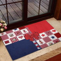 Red and navy patchwork rubber Christmas doormat with bow at entry floor