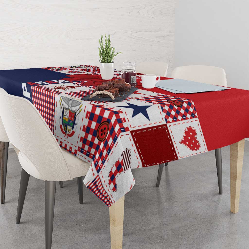 Red, white, and navy patchwork tablecloth with patterned corner drop over table