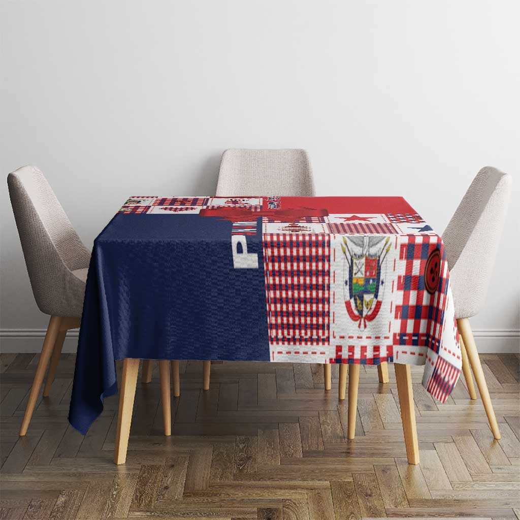 Patchwork tablecloth in red, white, and navy covering dining table with chairs