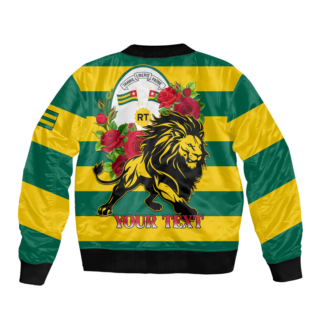 Back of green and yellow striped bomber with lion, roses, and crest; black ribbed hem