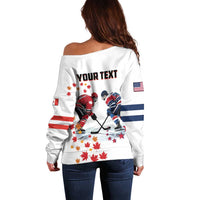 Women’s white off-shoulder hockey sweater, back view with “Your Text” and maple leaves