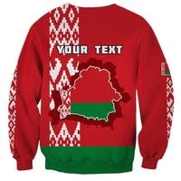 Red unisex sweatshirt back with Belarus map silhouette, "YOUR TEXT", and pixel patterns
