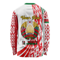 White long-sleeve shirt with Belarus emblem, folk red/green sleeves, “JULY” back print