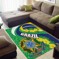 Green Brazil area rug with 'BRAZIL' headline, yellow flowers, and blue star emblem on diagonal