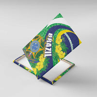 Folded Brazil-themed canvas wall art with green-blue crest, yellow flowers, and BRASIL lettering