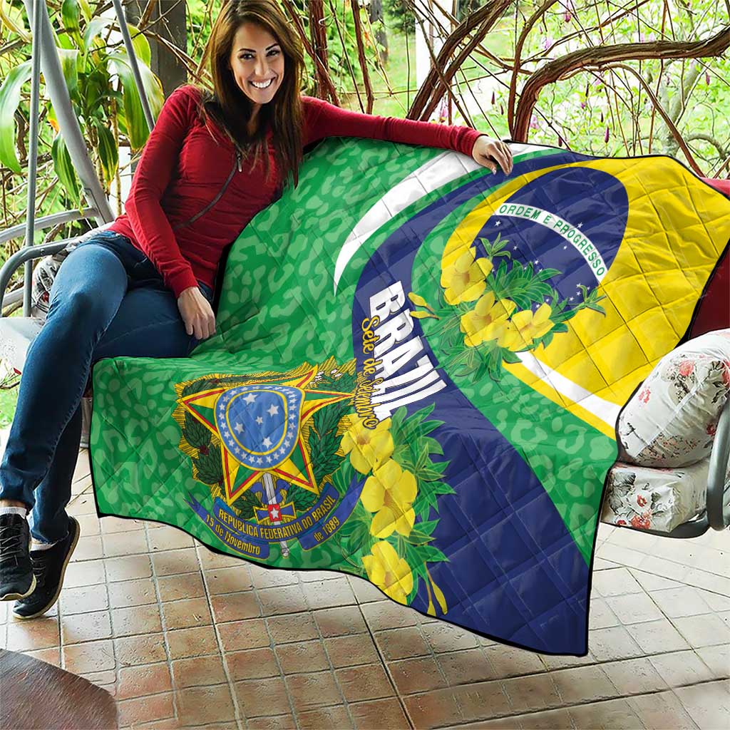 Brazil flag quilt blanket draped over sofa, green and yellow with blue globe crest