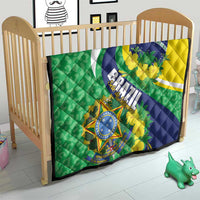 Brazil flag quilt blanket on crib, green and yellow with blue emblem and floral details