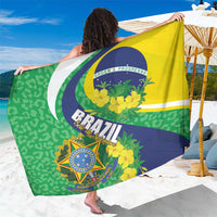 Brazil-themed sarong wrap with large emblem and yellow floral highlights, green-and-navy base